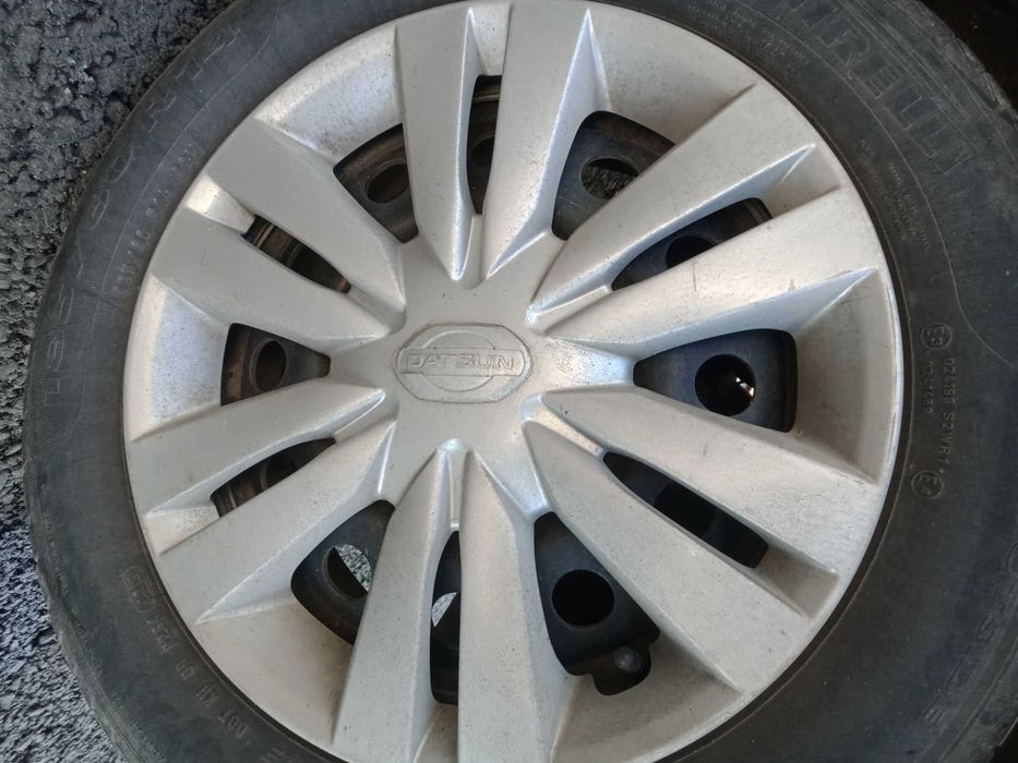 Продам три колпака r14 на datsun