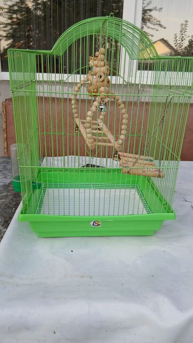 Клетка для попугаев,игрушки в подарок