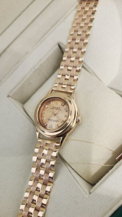 Женские золотые часы Rolex