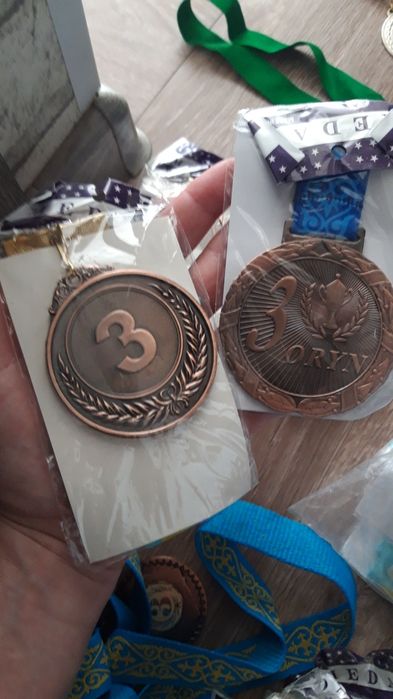 Медаль новая,город