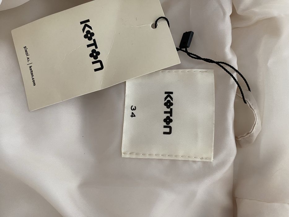 Пуховик НОВЫЙ (весна-осень)