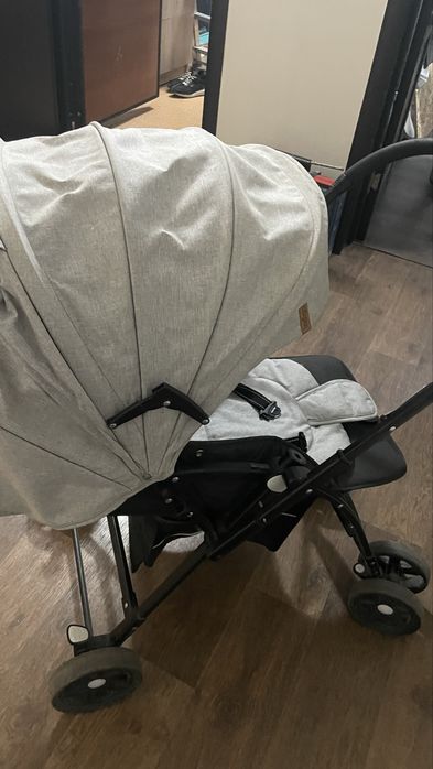 Продам коляску б/у и детский стульчик+ходунок