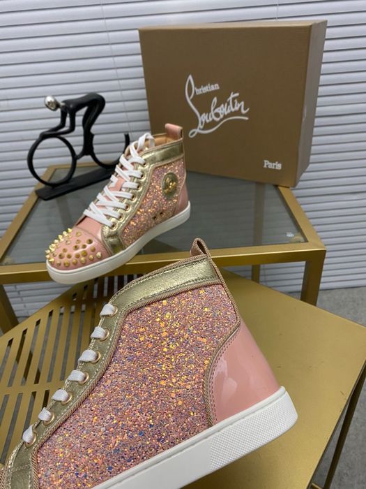Louboutin “WMNS”