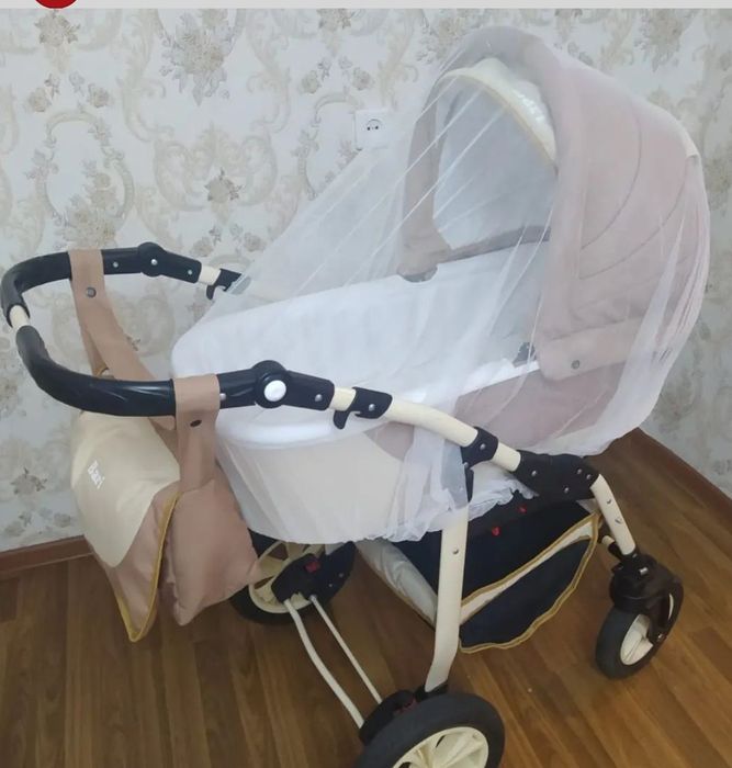 Коляска в идеальном состоянии.