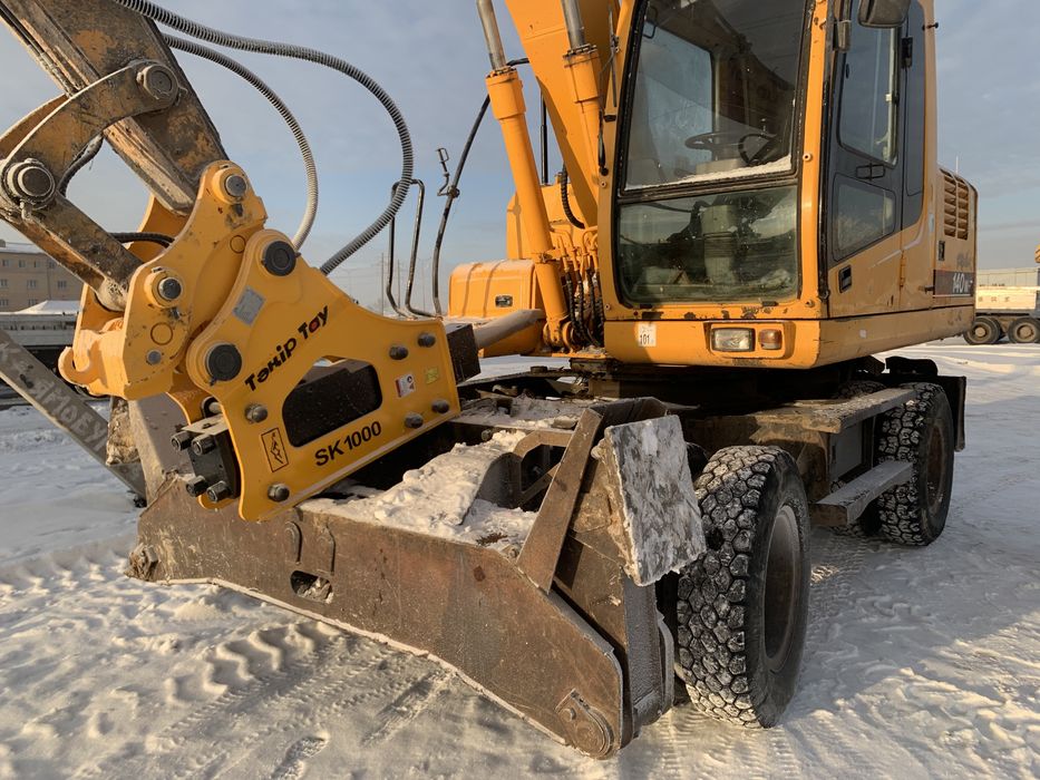 Аренда колесного экскаватора