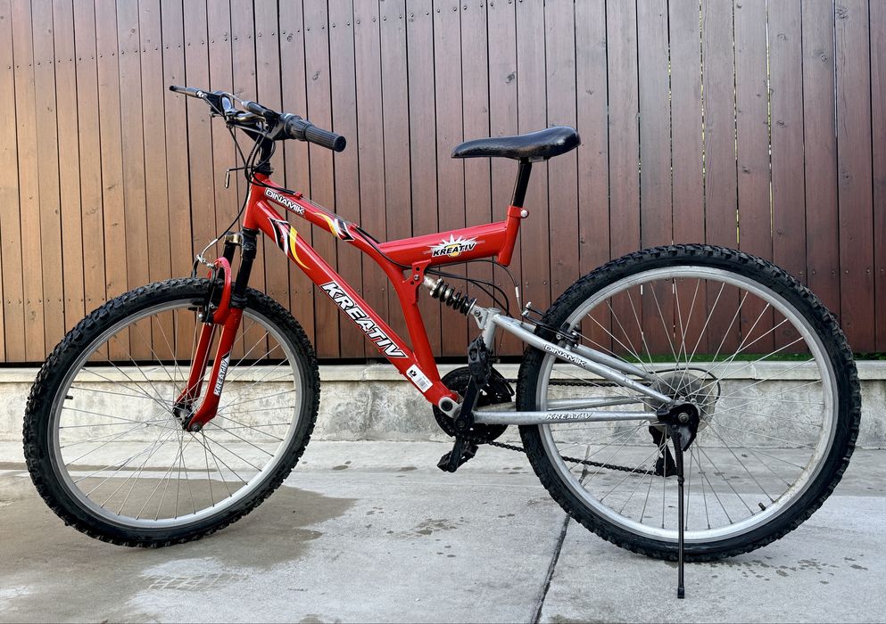 Bicicletă copii MTB Kreativ Dinamik 24", 18 viteze, dublă suspensie – stare bună