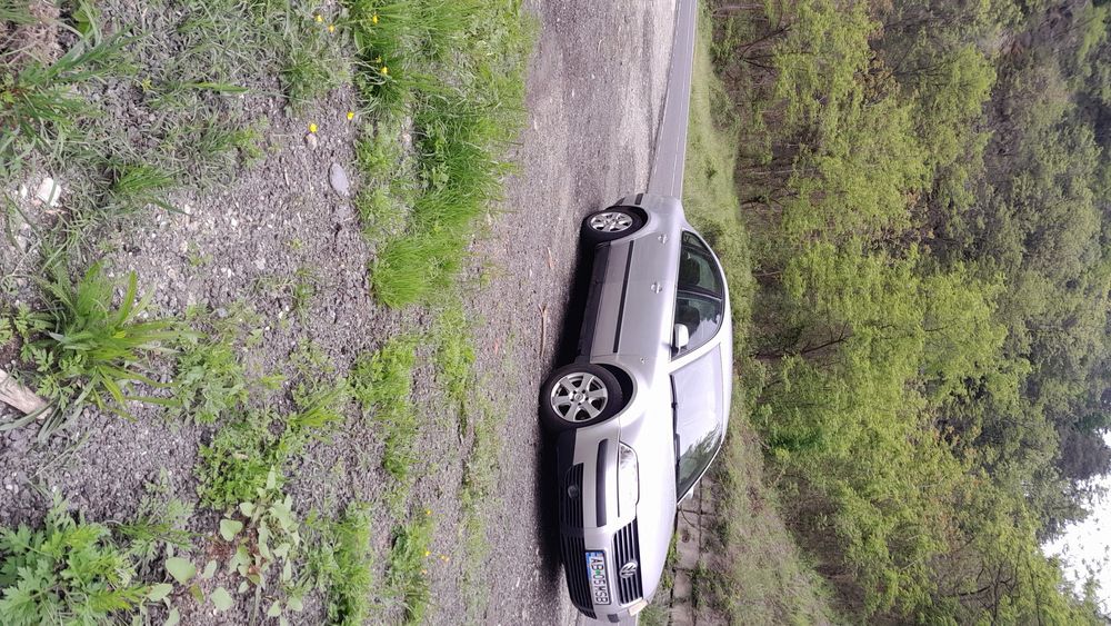 Passat 2002 berlina culoare gri clima totul funcționează  km reali