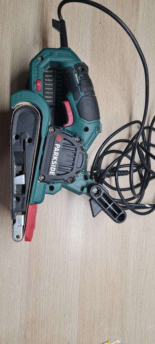 Șlefuitor cu banda Parkside PBSD 600 B1