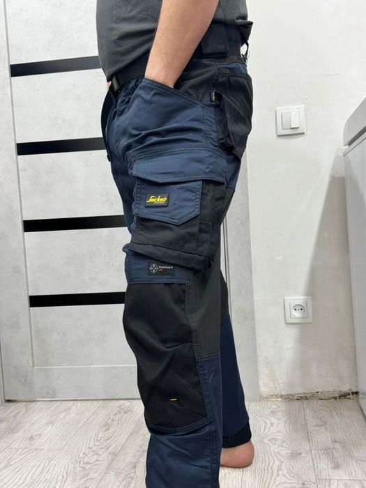 Рабочие брюки Snickers Workwear брендвый