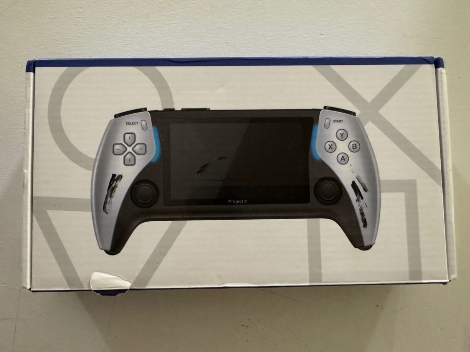 Продаю портативную игровую приставку ретро-игр Project X.