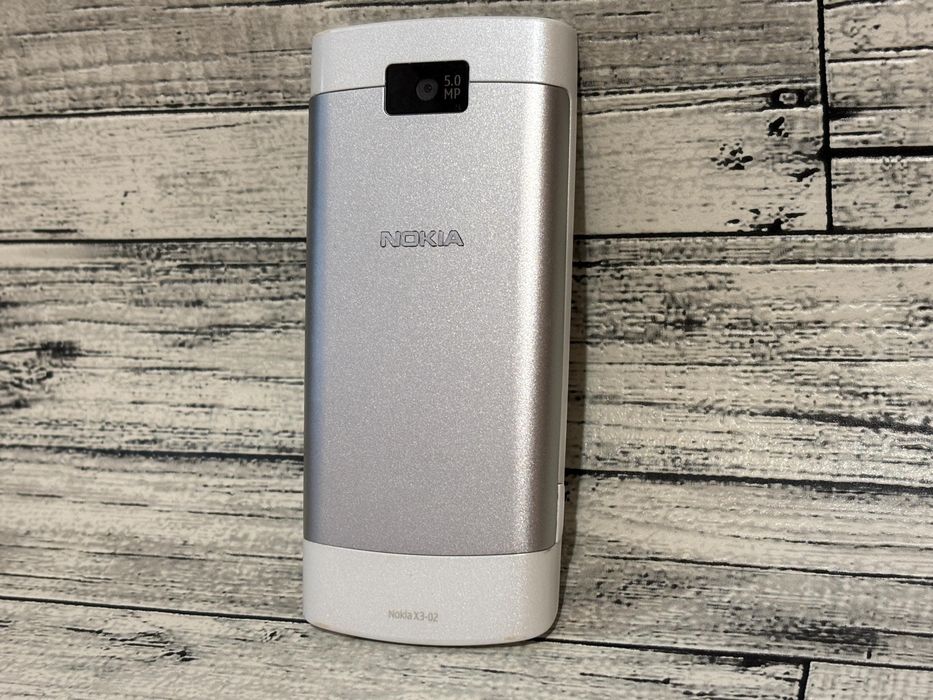 Nokia X3-02 полусенсорный