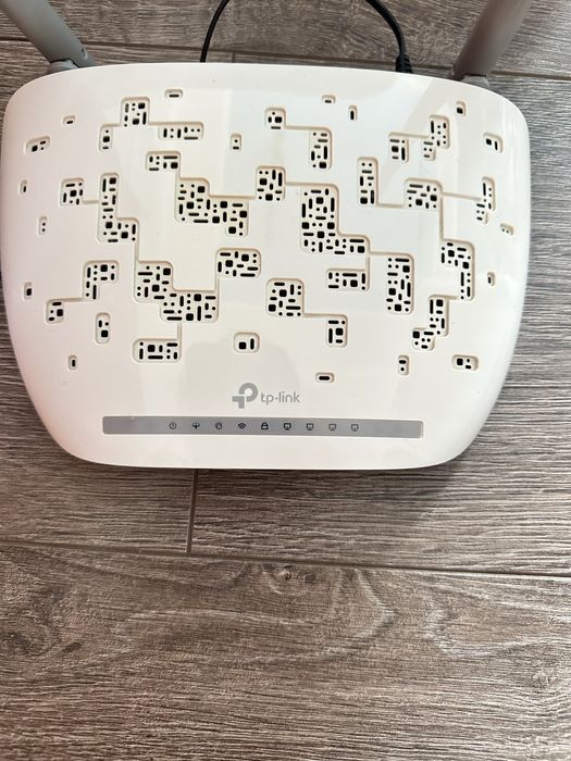 Модем tp-link белого цвета