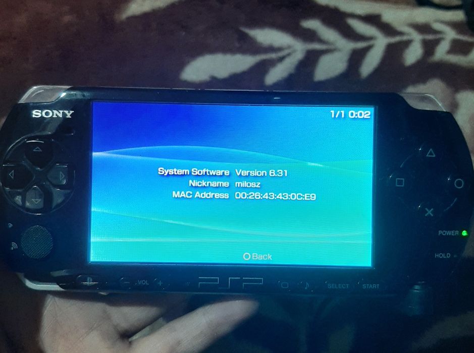 Vand psp în stare bună 3003 cu god of war
