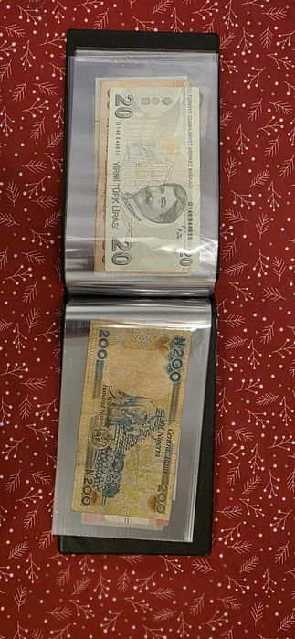 Vand album cu 20 bancnote.