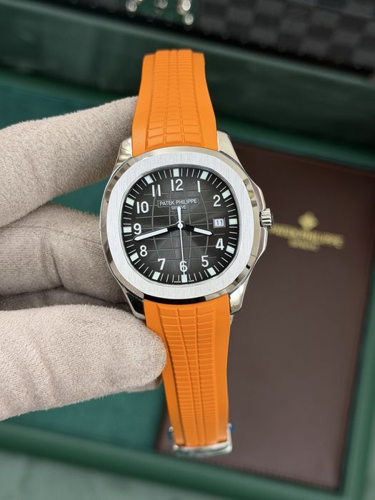 Patek Philippe Aquanaut – Black Dial, Orange Rubber Strap