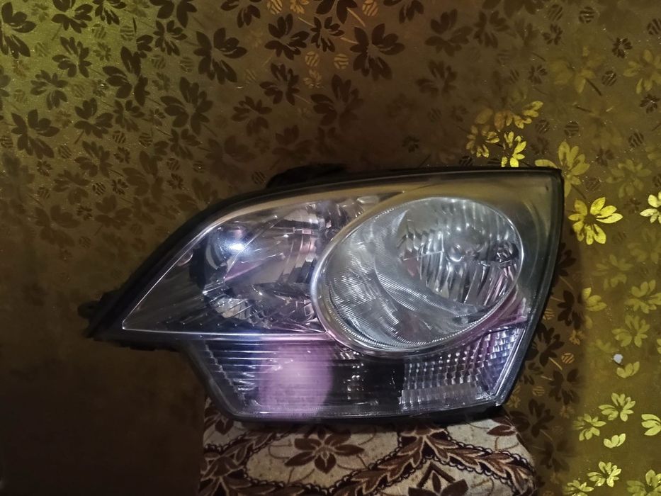 Vând faruri  Opel antara 2011