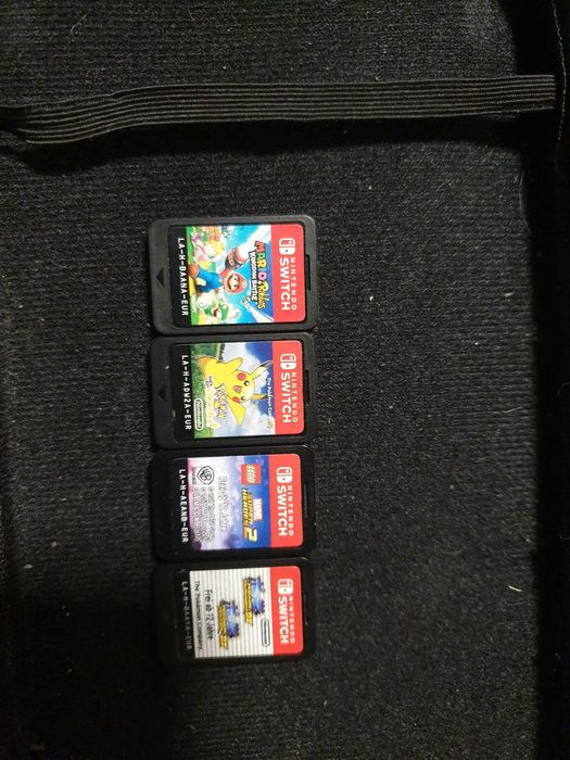 Organizator consola jocuri Switch  + 4 jocuri