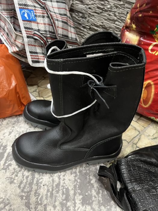 Продам новые сапоги