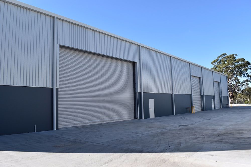 Всички видове гаражни врати, охранителни ролетки, индустриални врати