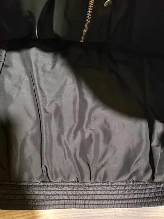 Пуховик женский .