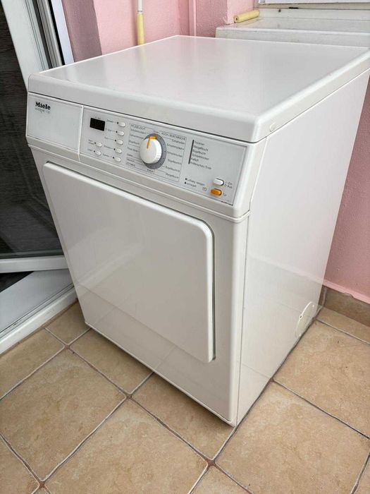 Masina de uscat haine