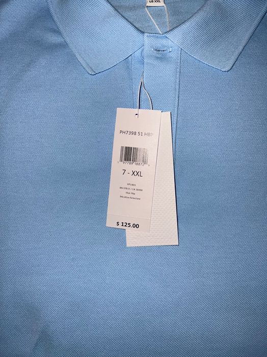Поло Lacoste небесно-голубого цвета с лампасами, размер XXL.