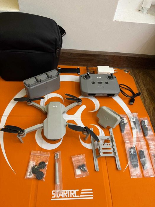 Vand drona DJI Mini 2 Fly More Combo – 4K + multe accesorii