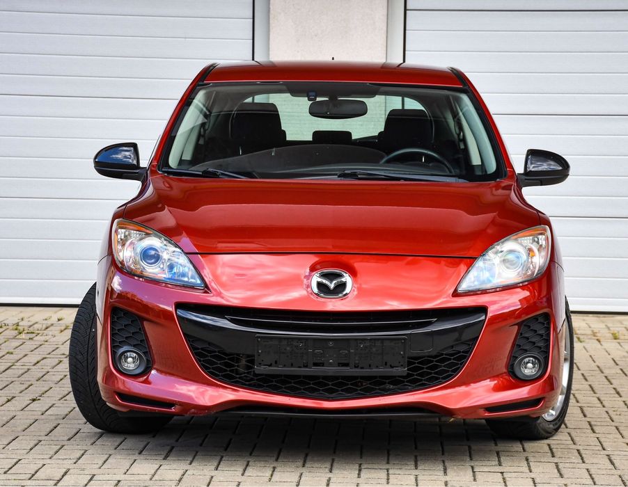 Mazda 3 model Kenko-Edition benzina 2013 105 cai