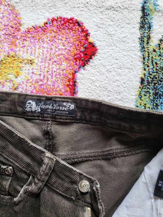 Pantaloni raiati maro