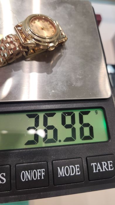 Женские золотые часы Rolex