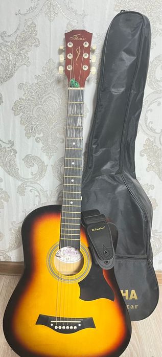 Продам,Гитару в хорошом состаянии в коплекте идет чихол + чихол