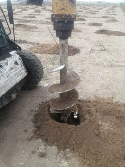 Услуги аренда ямобура. Буроям. Бур. Ямабур. Бурение