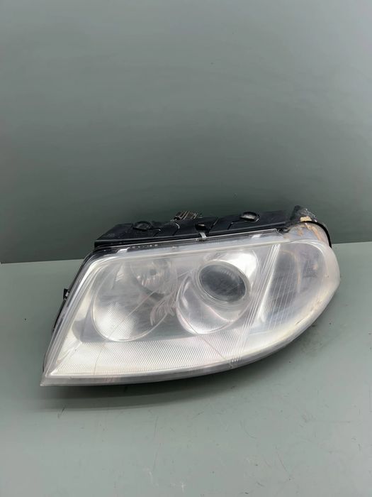 Far stanga cu lupa 206244B Volkswagen VW Passat 2003