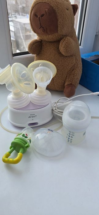 Электрический молокоотсос