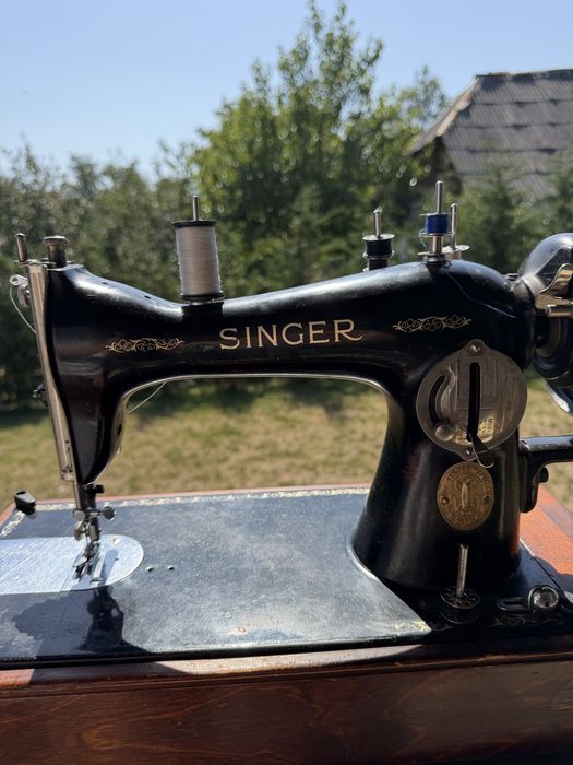 Mașină de cusut singer