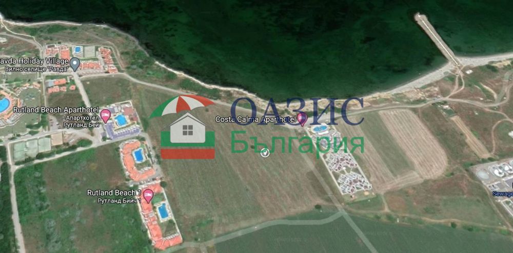 Парцел в статут на земеделски, на първа линия на морето, с. Ахелой,
