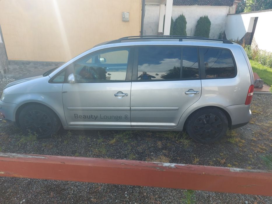 Vand vw touran 1.6 benzina automata