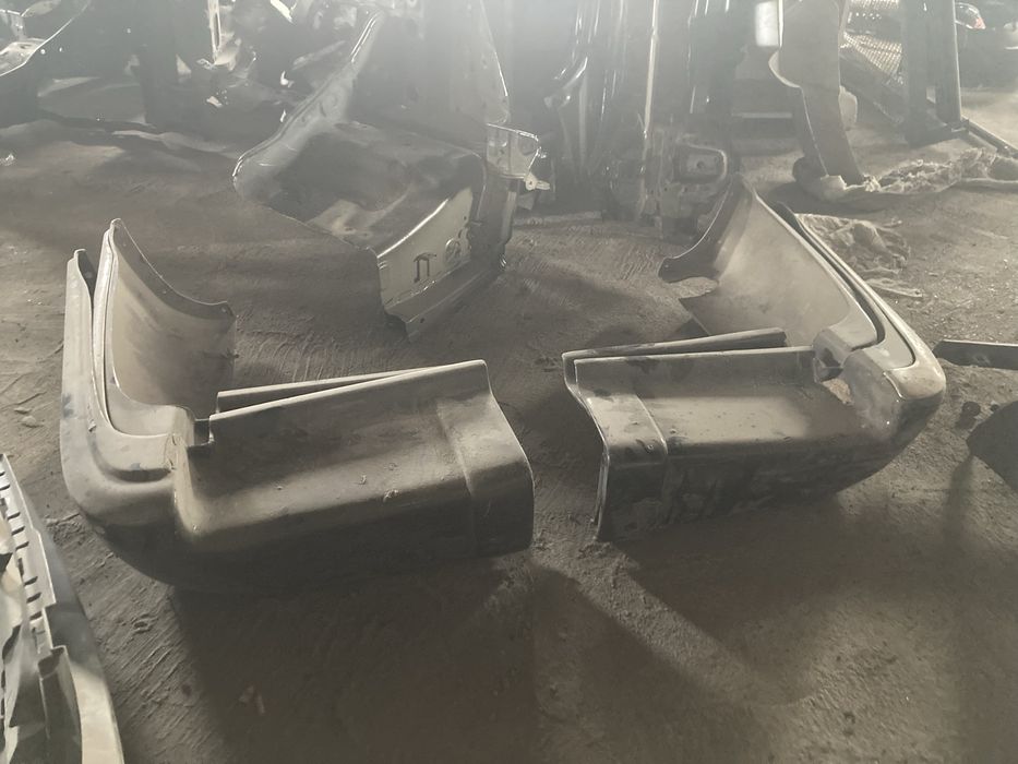 Клыки боковые накладки заднего бампера Тойота Лэнд Крузер 80