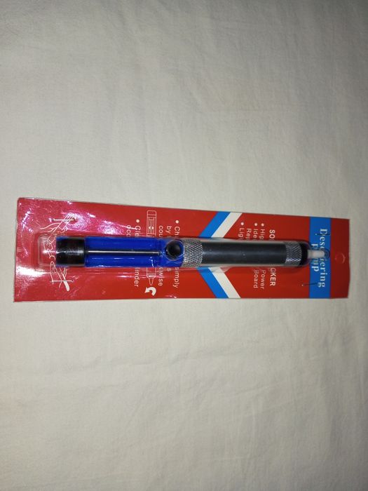 Олово отсос для паяльных работ.