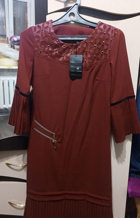 Платья новые,  не рошенные