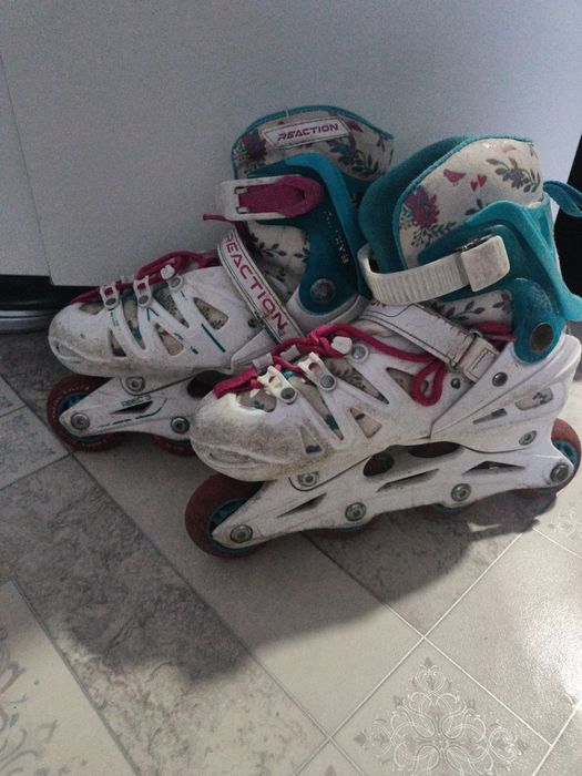 Роликовые коньки