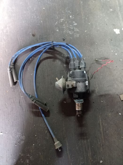 Трамблёр  мотор Ниссан J15