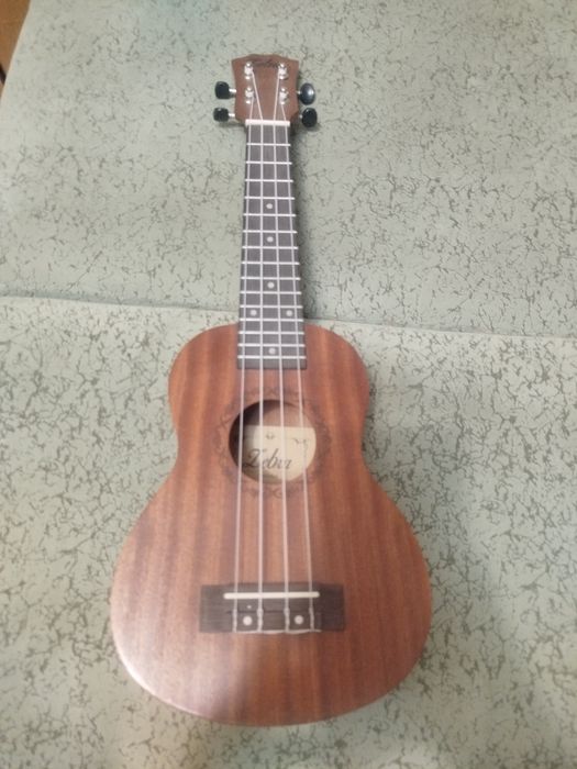 Продам укулеле новый