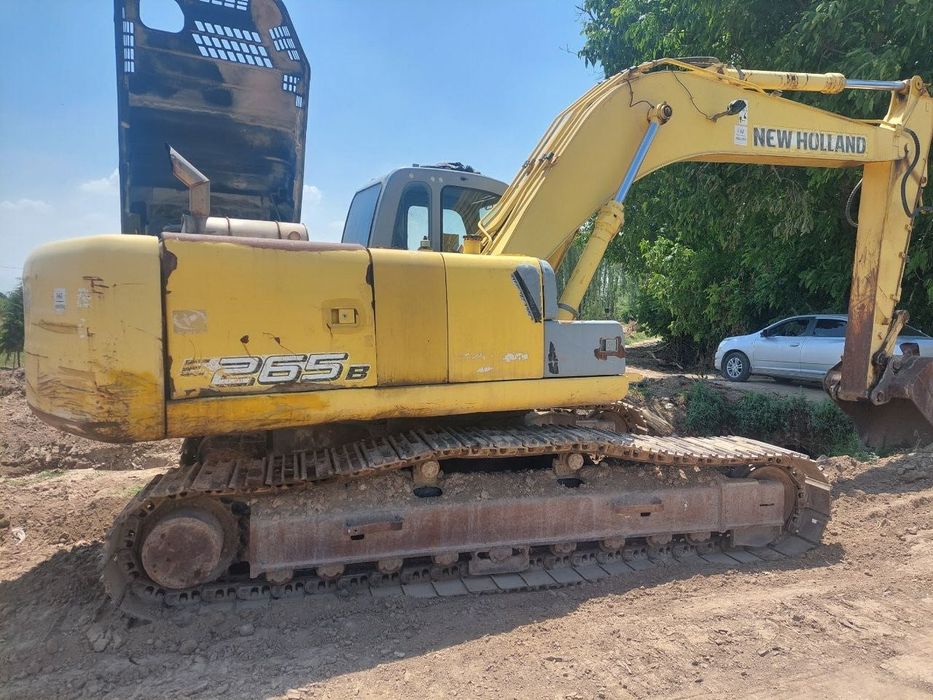 New Holland экскаватор