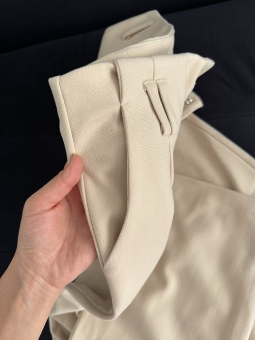 Теплые бежевые брюки