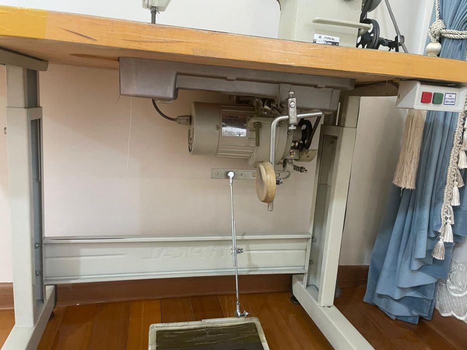 Швейная машина .