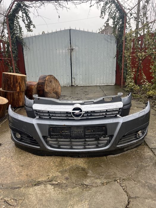 Bara fata+ grila + spalatoare faruri si bara spate Opel Astra H