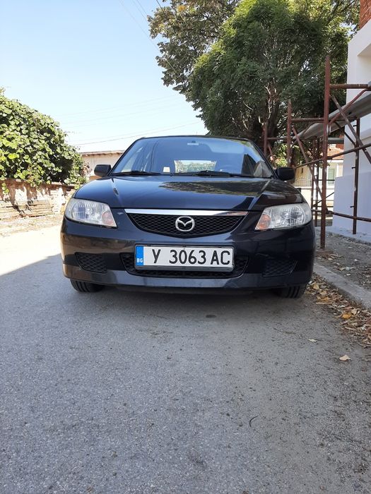 Mazda 323f, бензин 1.3- 72к.с