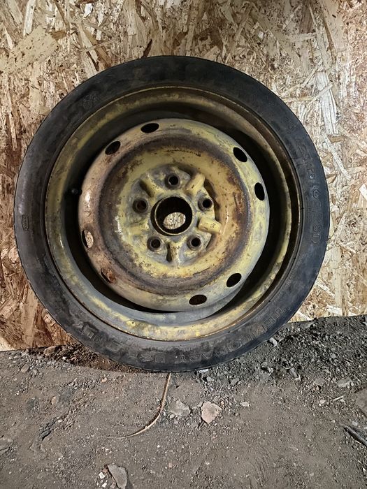 Запасное колесо докадка