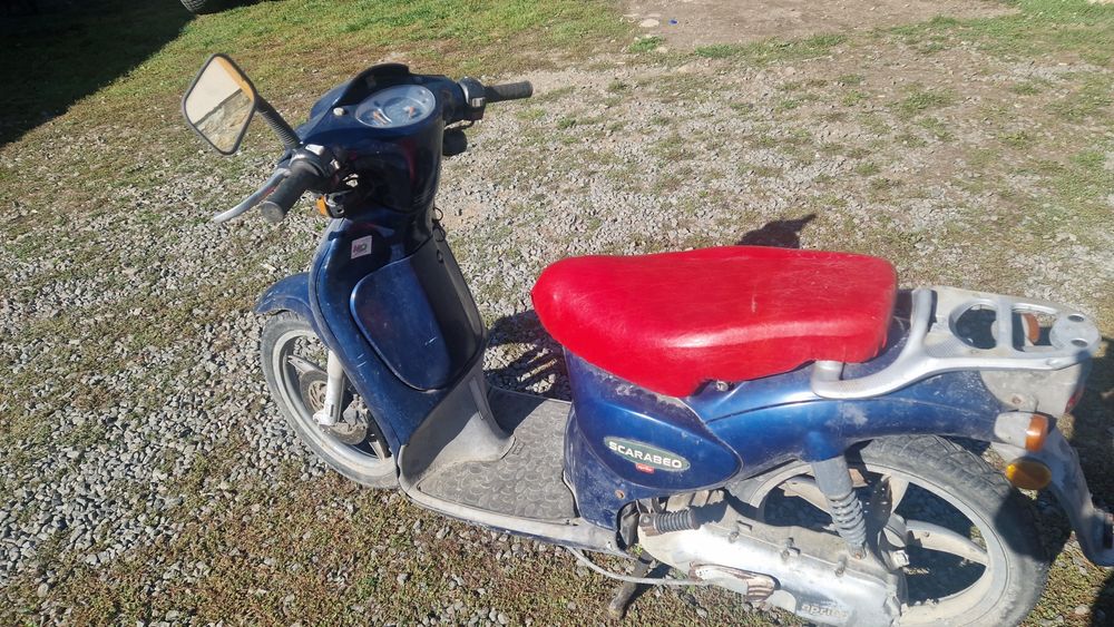 Aprilia  scarabeo 49cc si Honda Deauville 650cc v-twin